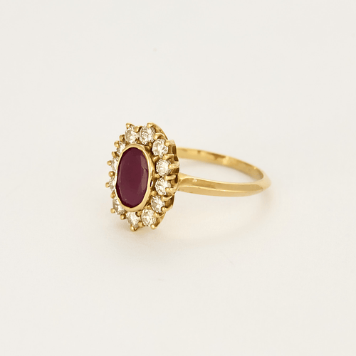 Bague marguerite en or jaune , rubis et diamants