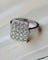 Bague 56.5 Bague Art Déco rectangle pavée en or blanc et diamants 58 Facettes A11240