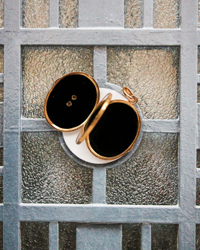 Anhänger Anhänger zum Öffnen aus 750er Roségold und Onyx 58 Facettes A11902