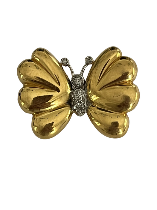 Broche mariposa en oro amarillo y diamantes blancos