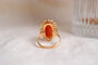 https://www.noircarat.fr/wp-content/uploads/2024/06/Bague-cabochon-Corail-oval-bague-eco-responsable.jpg