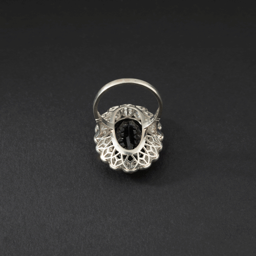 Bague 51 Bague marguerite sertie d’un saphir ovale en platine et diamants 58 Facettes
