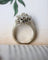 Bague 59 Bague Marguerite 1950 en or blanc et diamants 58 Facettes C2091