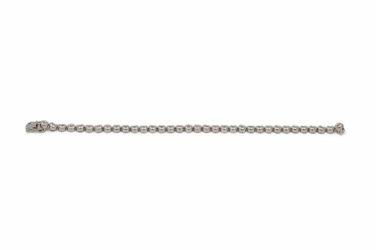 Bracelet Bracelet tennis en or gris 18k et diamants 58 Facettes REF24060-223