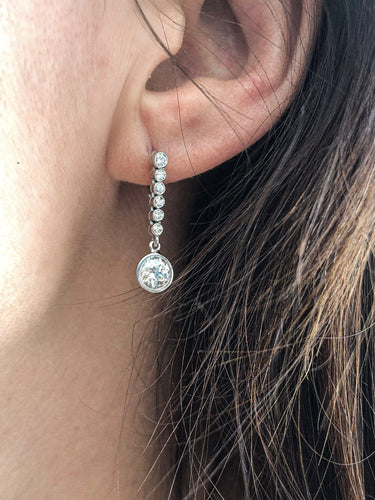 Boucles d'oreilles Boucles d'oreilles dormeuses en platine et diamants taille ancienne 0,70 ct 58 Facettes 1