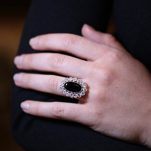 Bague 51 Bague marguerite sertie d’un saphir ovale en platine et diamants 58 Facettes
