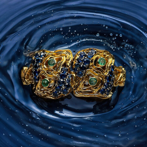Bracelet Lalaounis - Bracelet BIOSYMBOLS articulé en or jaune 18k, saphirs et émeraudes 58 Facettes