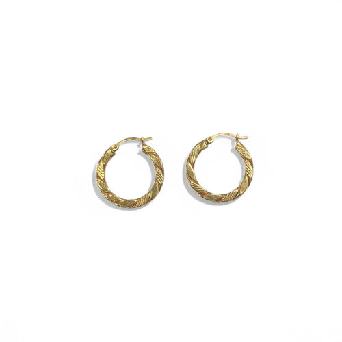 Boucles d'oreilles Créoles torsadées en or jaune 18K 58 Facettes