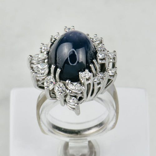 Anello 53.5 Anello in oro bianco 750 con zaffiro stellato e diamanti 58 Facettes 1864