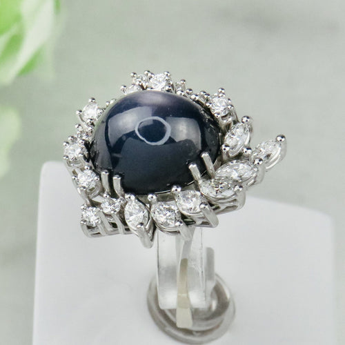 Anello 53.5 Anello in oro bianco 750 con zaffiro stellato e diamanti 58 Facettes 1864