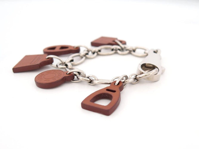 Bracelet Hermès Olga Amulette - Bracelet en cuir Barenia et acier palladié 58 Facettes 265386