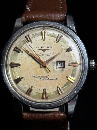 Montre Longines Conquest Calendar - Montre automatique vintage réf. 9004 en acier 58 Facettes
