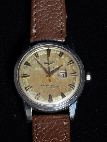 Montre Longines Conquest Calendar - Montre automatique vintage réf. 9004 en acier 58 Facettes
