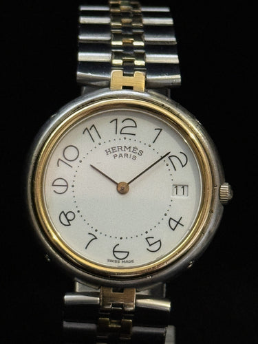 Montre Hermès Clipper - Montre vintage quartz en or et acier 58 Facettes