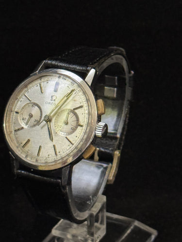 Montre Omega - Montre chronographe vintage réf. 101.009 cal. 320 en acier 58 Facettes