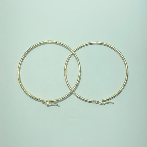 Minđuše Uvrnute zlatne minđuše od žutog zlata 18 karata, 8,64 g 58 Facettes 250315