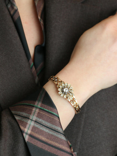 Bracelet Bracelet Napoléon III fleur mobile en or rose et diamants 58 Facettes 1085.3
