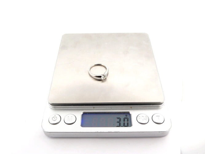 Bague 50 bague solitaire 0.63ct gia t50 or blanc 18k + alliance sertie diamant 0.1ct 58 Facettes 270398