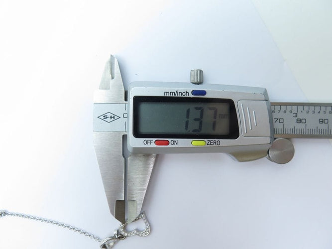 Collier Piaget Limelight - Collier chaîne Y avec pendentif cœur en or blanc et diamants 0,29 ct 58 Facettes 221585