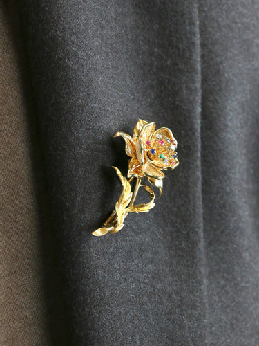 Broche Broche fleur vintage en or jaune 18 carats, diamants et pierres précieuses 58 Facettes 1126.6