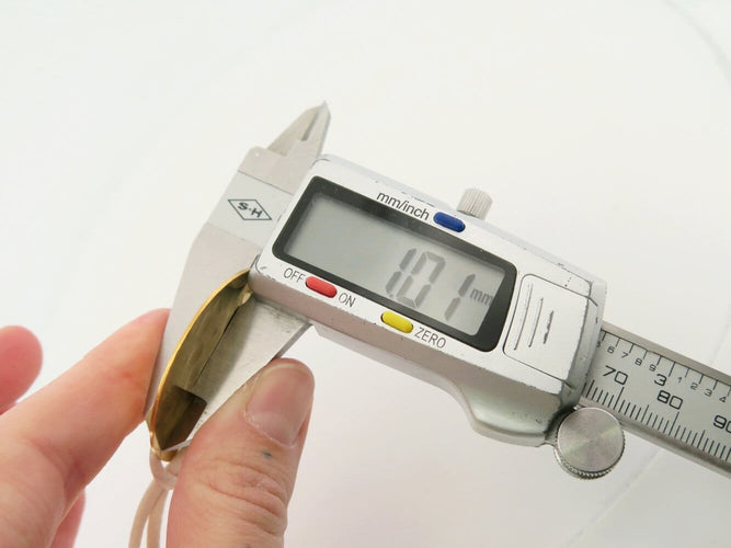 Collier Dinh Van - Collier pendentif Pi 40 mm en or jaune 24k martelé 58 Facettes 271154