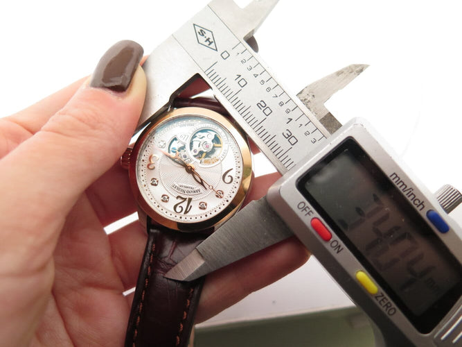 Montre Armand Nicolet LL9 - Montre femme 34 mm acier et or rose 18K diamants 58 Facettes 270559