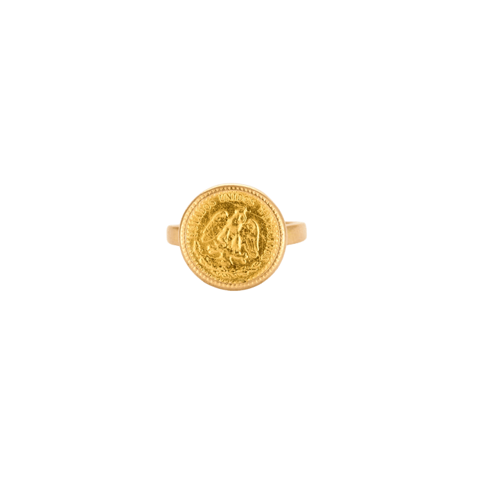 Anillo de oro amarillo monedas de oro.