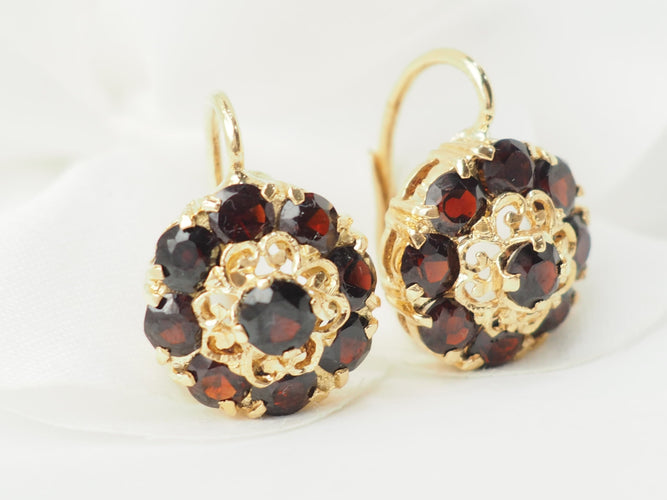 Boucles d'oreilles Boucles d’oreilles dormeuses en or jaune 18 ct et grenats 58 Facettes 33473