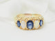 Bague 56.5 Bague jarretière en or jaune 18 kt, saphirs et pierres de lune 58 Facettes 33246