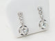 Boucles d'oreilles Paire de dormeuses anciennes en or blanc 18 ct et diamants 58 Facettes 32108