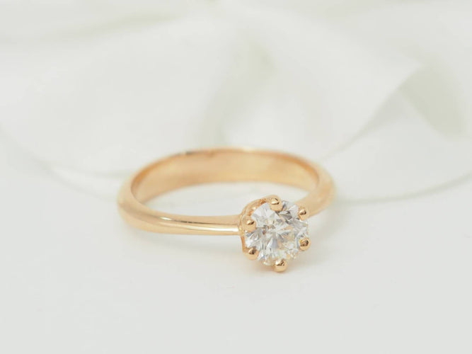 Bague 51.5 Bague solitaire en or rose 18 kt et diamant 0,69 ct certifié 58 Facettes 31906