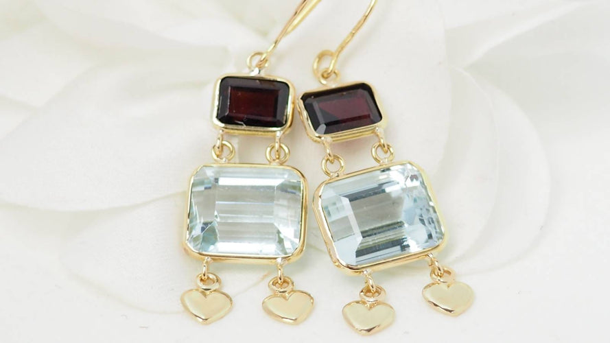 Boucles d'oreilles Boucles d'oreilles en or jaune 18 ct, aigue-marine et grenats 58 Facettes 31504