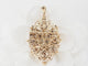 Pendentif Broche pendentif en or jaune 18 ct, émeraude, grenats et perles 58 Facettes 33147
