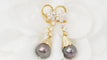 Boucles d'oreilles Boucles d’oreilles pendantes en or jaune 18 ct, diamants et perles de Tahiti 58 Facettes 32802