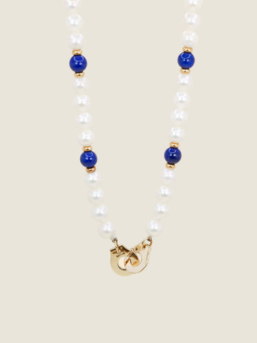 Collier Dinh Van Menottes R10 - Collier en or jaune 18 carats, perles et lapis-lazuli 58 Facettes 1204.7