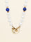 Collier Dinh Van Menottes R10 - Collier en or jaune 18 carats, perles et lapis-lazuli 58 Facettes 1204.7