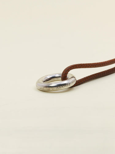 Collier Hermès Glenan - Collier en argent 925 et cuir marron 58 Facettes 1206.9
