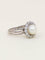 Bague 50 Bague marguerite vintage en or blanc 18 carats avec perle et diamants 58 Facettes 1186.3