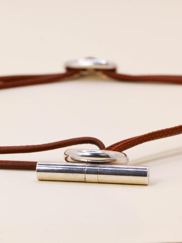 Collier Hermès Glenan - Collier en argent 925 et cuir marron 58 Facettes 1206.9