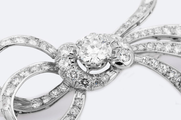 Bague Oro Bianco Bague nœud inversé vintage en or 18 ct et diamants 58 Facettes spl112