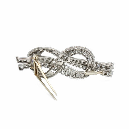 Boucles d'oreilles Clip de revers nœud en or gris 18 carats, platine et diamants 58 Facettes REF23108-130