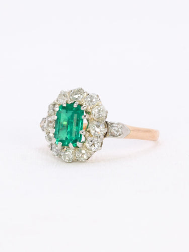 Bague 53 Bague marguerite ancienne en or rose et blanc 18 carats, émeraude et diamants 58 Facettes 1108.11