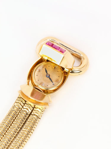 Montre UTI - Montre secrète tubogas en or jaune 18 carats, diamants et rubis calibrés 58 Facettes 1153.5