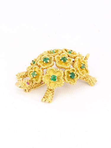 Broche Broche tortue en or jaune 18 carats, émeraudes et rubis 58 Facettes 1170.2