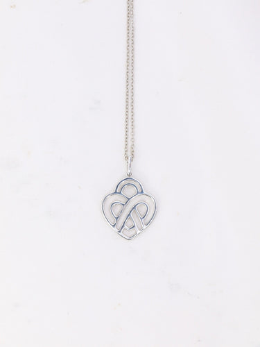 Collier Poiray - Collier cœur entrelacé en or blanc 18K et diamants 58 Facettes 1091.1