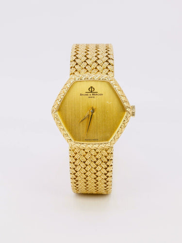 Montre Baume & Mercier - Montre vintage en or jaune 18 carats à maille tressée 58 Facettes 1067.3