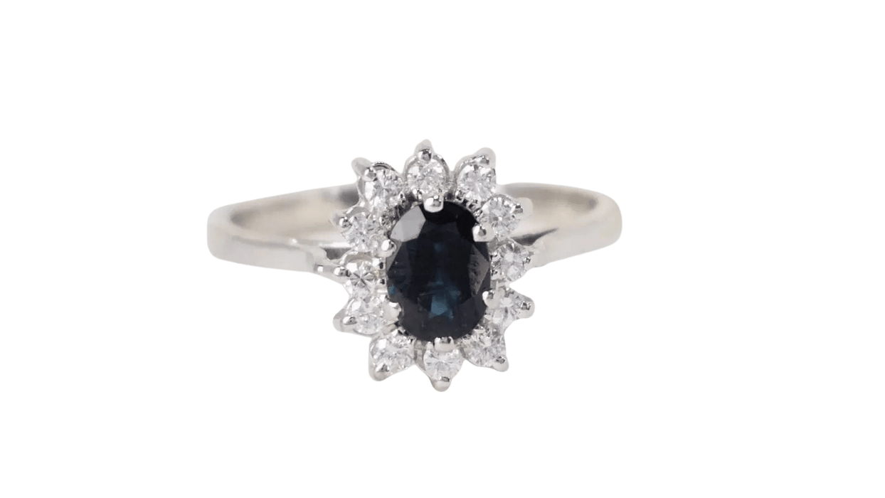 Bague 52.5 Bague marguerite en or blanc, Saphir ovale et diamants 58 Facettes 32933