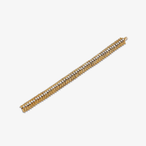 https://reuvenveksler.com/wp-content/uploads/2025/06/Tiffany-Co.-New-York-Diamond-Bracelet-in-18kt-Two-Tone-Gold-scaled.jpg