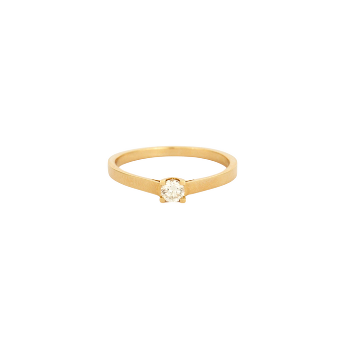 Yellow gold solitaire set with a diamond