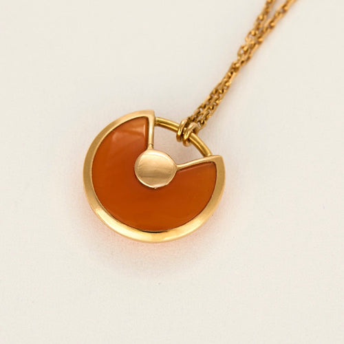 Collier CARTIER - Amulette - Collier en or jaune, cornaline et diamants 58 Facettes DV15656-5